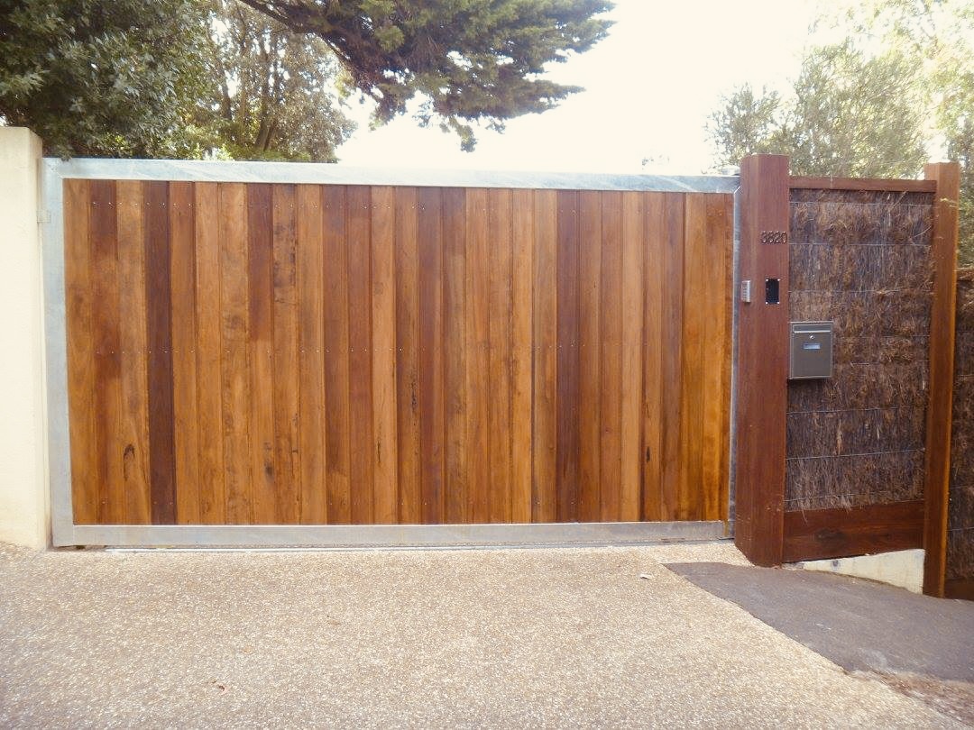 Automated Sliding Gate with Dressed Spotted Gum Tongue and Groove Lining Boards Insert