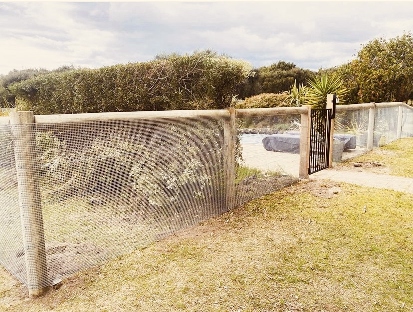 Pool Safe Mesh on Round Pine Poles with Top Rail